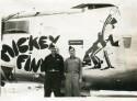 Captain David Adair (L) and Lt. Edmond R Bellemare (R) in front of Bellemare's A.C 